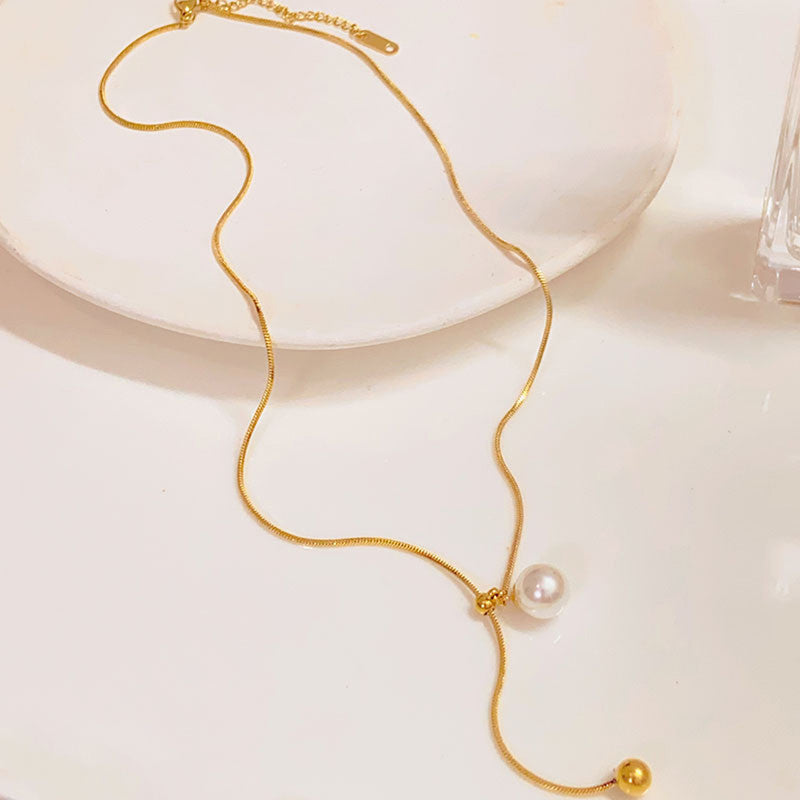 Jewels Galaxy Gold Plated Stainless Steel Anti Tarnish Pearl Studded Pendant