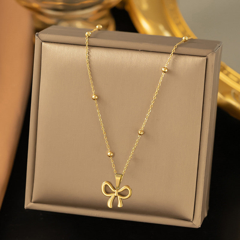 Jewels Galaxy Gold-Plated Anti Tarnish Stainless Steel Infinity Bow Pendant