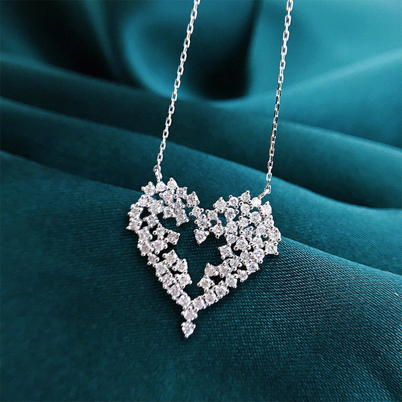 Jewels Galaxy Silver Plated American Diamond Studded Heart Themed Pendant