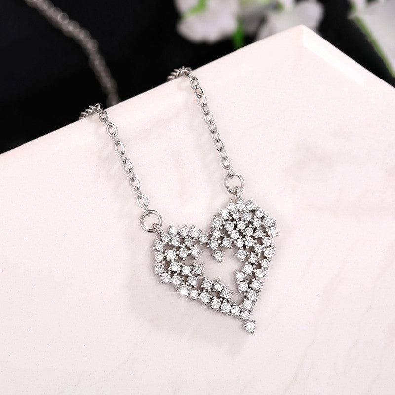 Jewels Galaxy Silver Plated American Diamond Studded Heart Themed Pendant