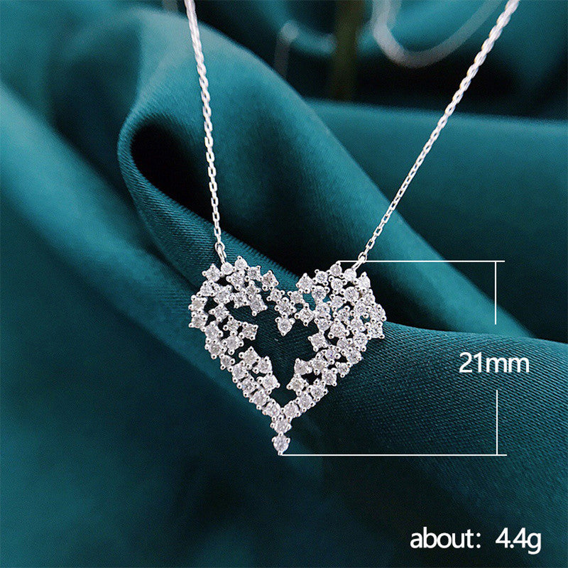 Jewels Galaxy Silver Plated American Diamond Studded Heart Themed Pendant