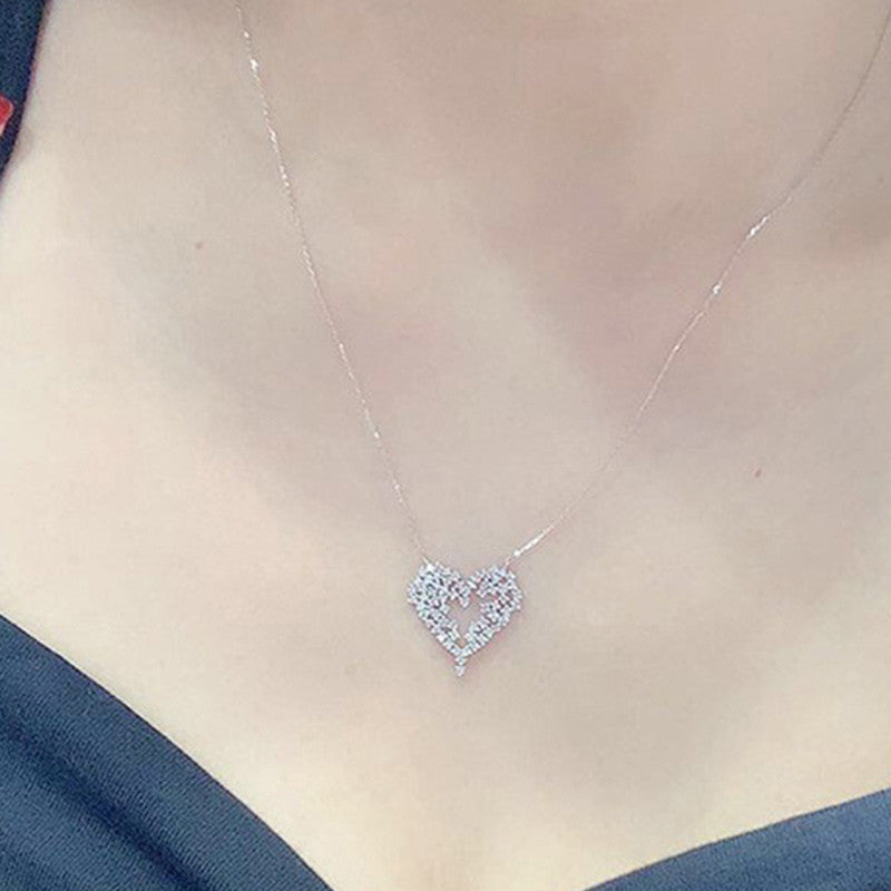 Jewels Galaxy Silver Plated American Diamond Studded Heart Themed Pendant
