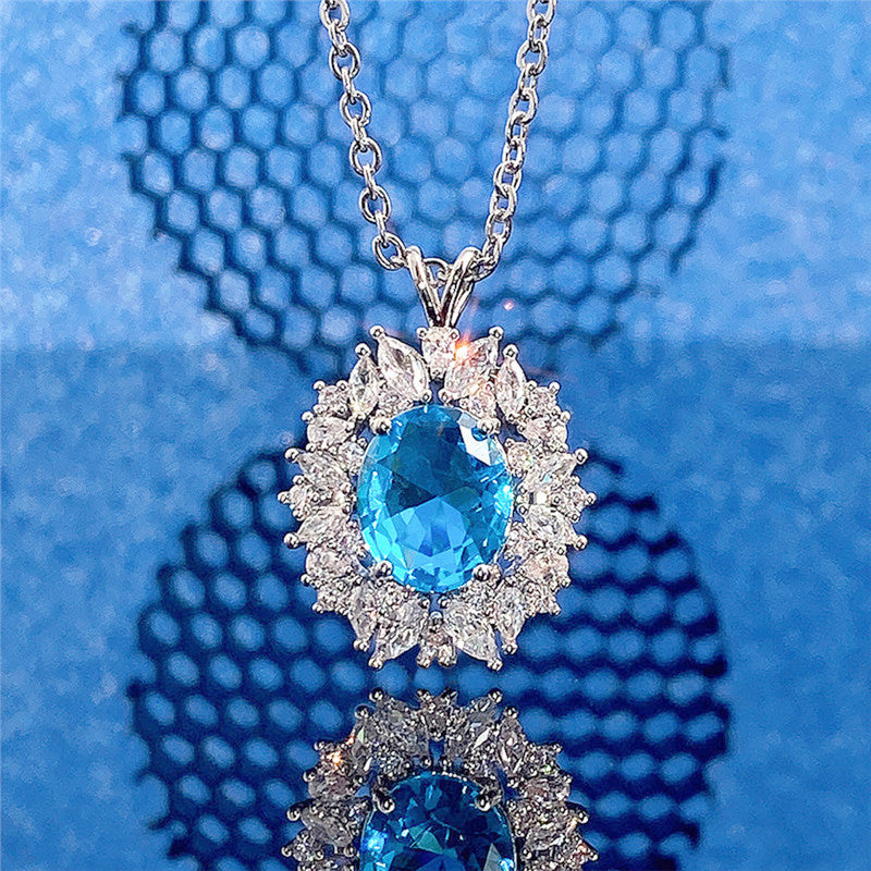 Jewels Galaxy Silver Plated American Diamond Studded Blue Oval Shape Contemporary Pendant