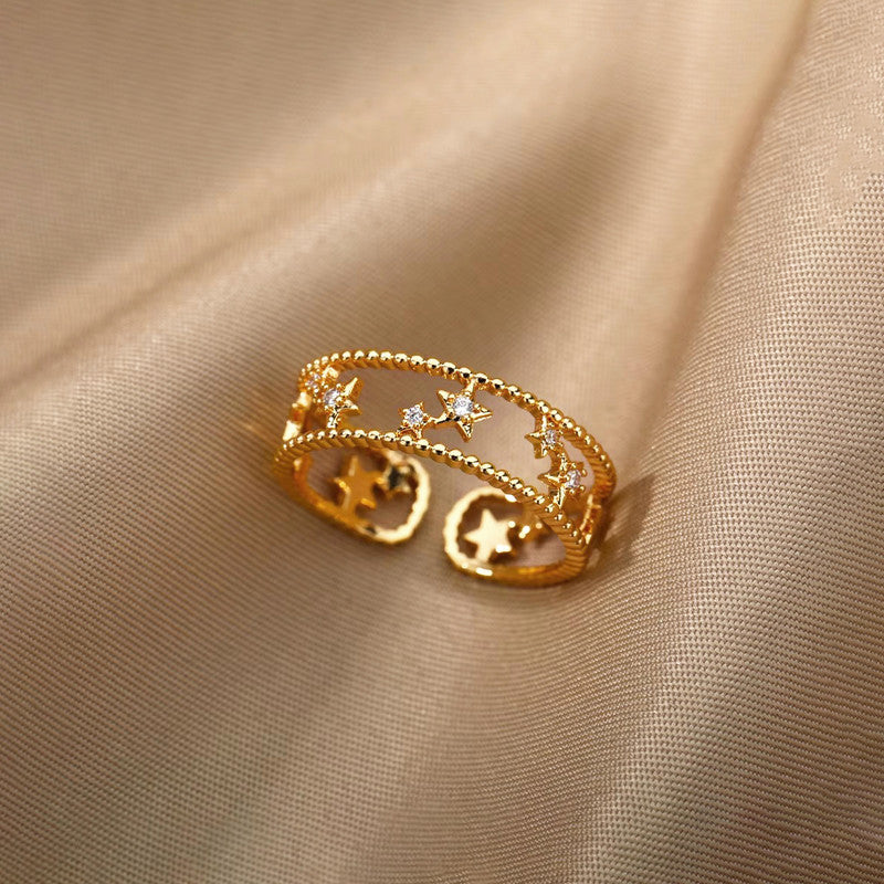 Jewels Galaxy Gold Plated Anti Tarnish Stainless Steel Star Themed Adjustable Finger Ring