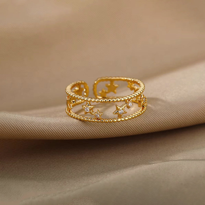 Jewels Galaxy Gold Plated Anti Tarnish Stainless Steel Star Themed Adjustable Finger Ring