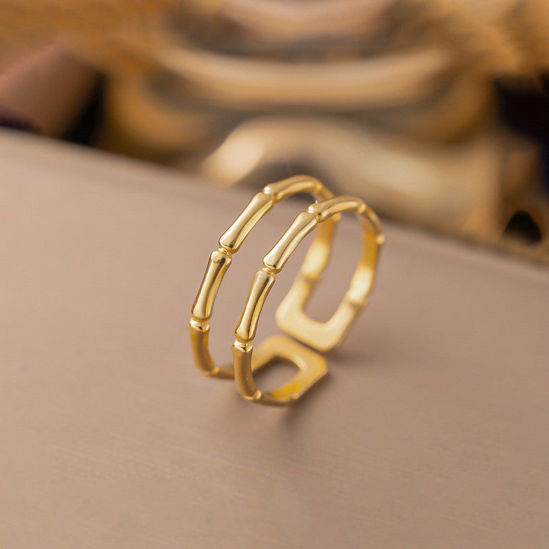 Jewels Galaxy Gold Plated Anti Tarnish Stainless Steel Contemporary Adjustable Finger Ring