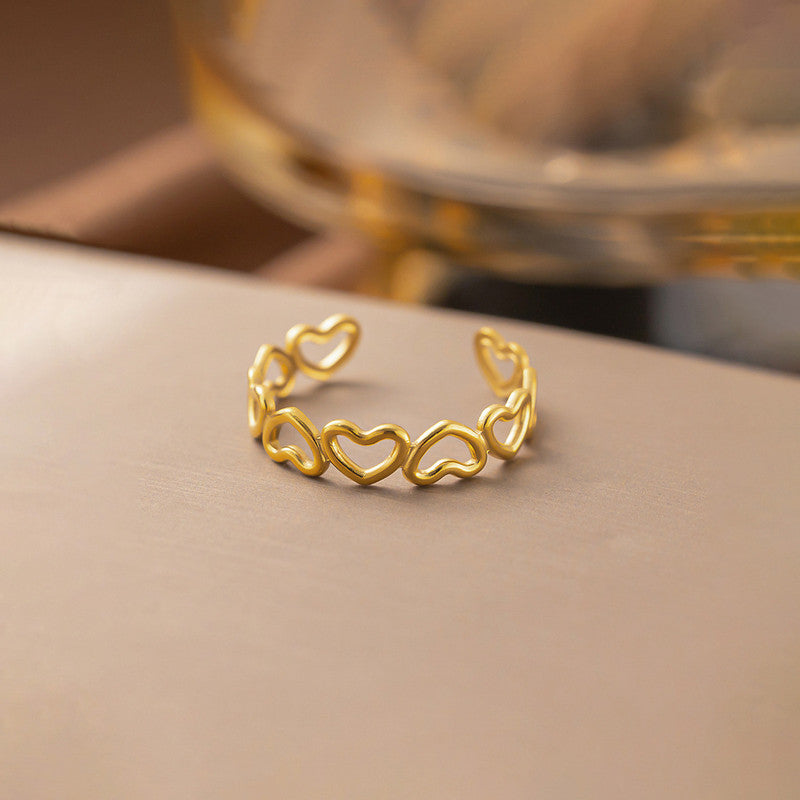 Jewels Galaxy Gold Plated Anti Tarnish Stainless Steel Heart Themed Adjustable Finger Ring