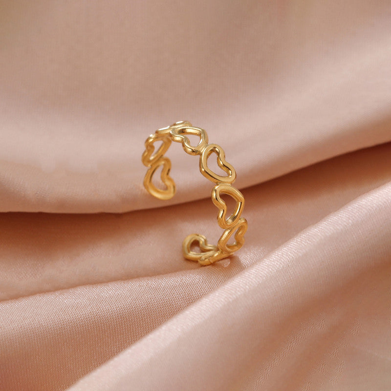 Jewels Galaxy Gold Plated Anti Tarnish Stainless Steel Heart Themed Adjustable Finger Ring