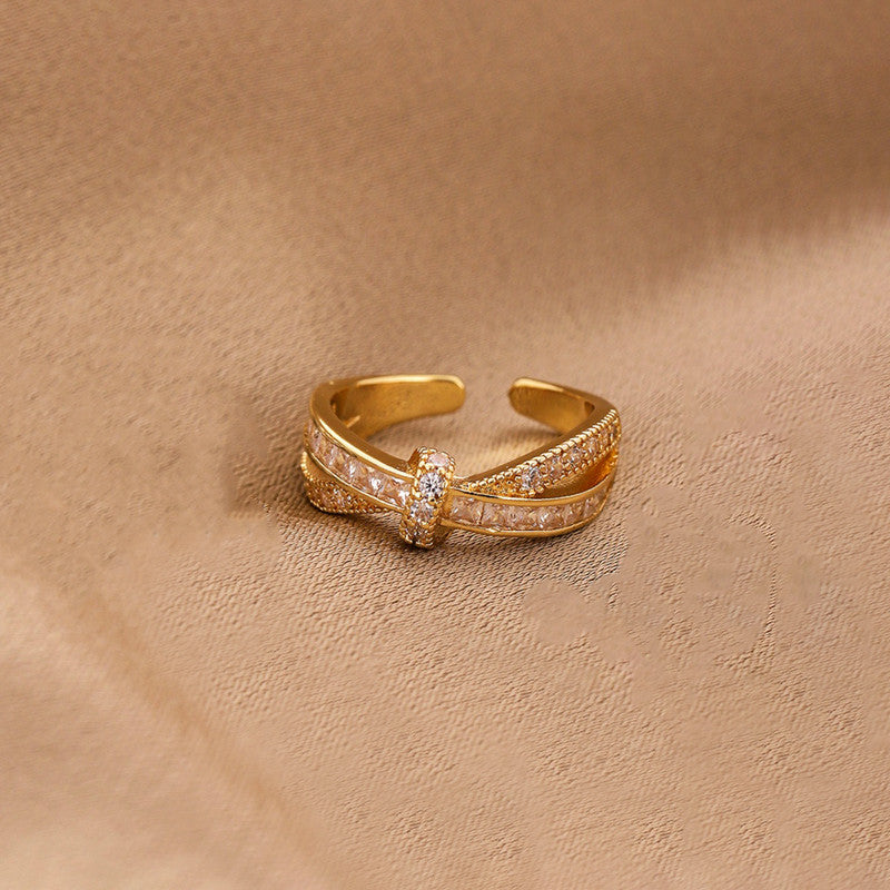 Jewels Galaxy Gold Plated Anti Tarnish Stainless Steel Cross Shaped Adjustable Finger Ring