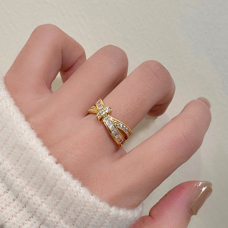 Jewels Galaxy Gold Plated Anti Tarnish Stainless Steel Cross Shaped Adjustable Finger Ring