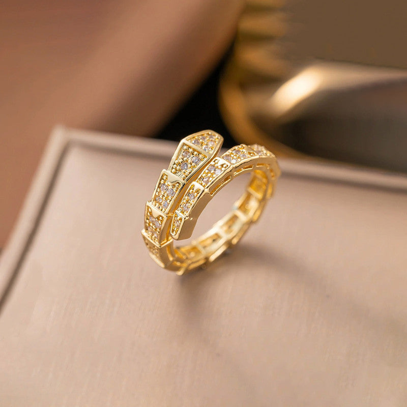 Jewels Galaxy Gold Plated Anti Tarnish Stainless Steel Snake Themed Adjustable Finger Ring