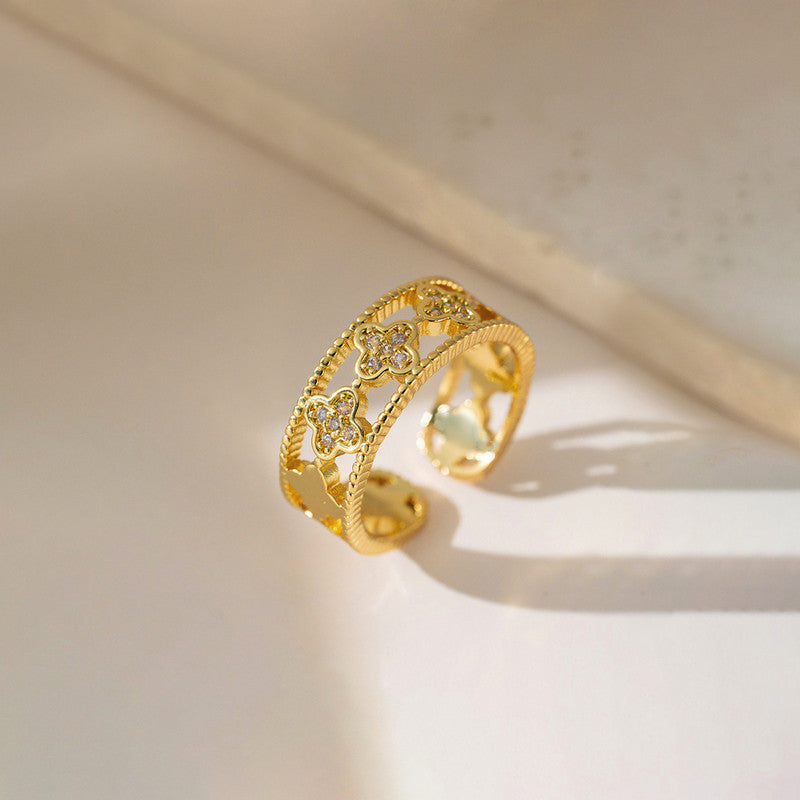 Jewels Galaxy Gold Plated Anti Tarnish Stainless Steel Clover Themed Adjustable Finger Ring