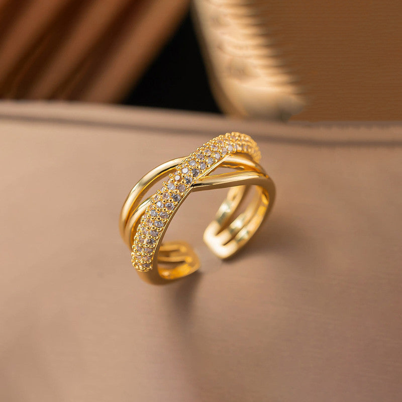 Jewels Galaxy Gold Plated Anti Tarnish Stainless Steel Cross Shaped Adjustable Finger Ring