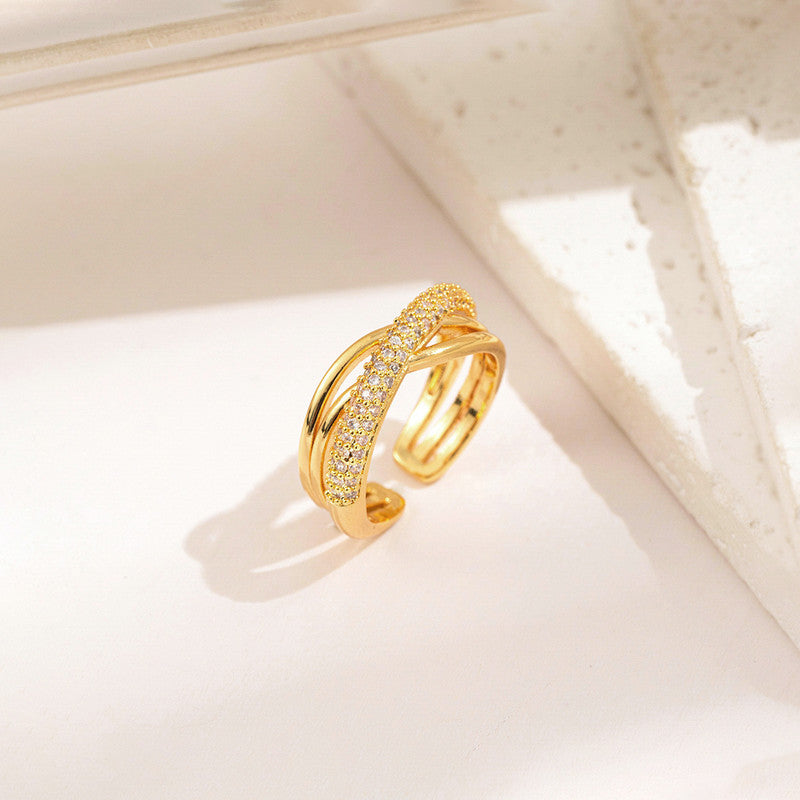Jewels Galaxy Gold Plated Anti Tarnish Stainless Steel Cross Shaped Adjustable Finger Ring