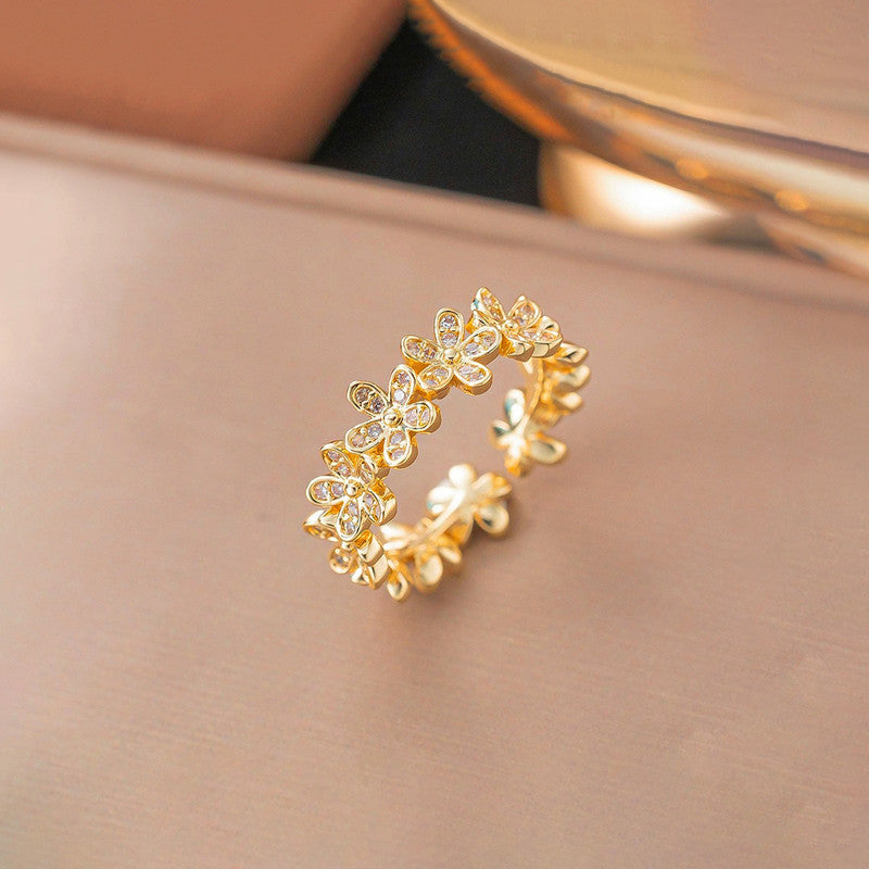 Jewels Galaxy Gold Plated Anti Tarnish Stainless Steel Floral Themed Adjustable Finger Ring