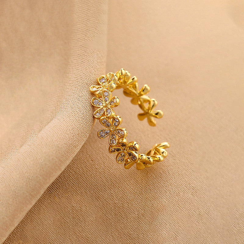 Jewels Galaxy Gold Plated Anti Tarnish Stainless Steel Floral Themed Adjustable Finger Ring
