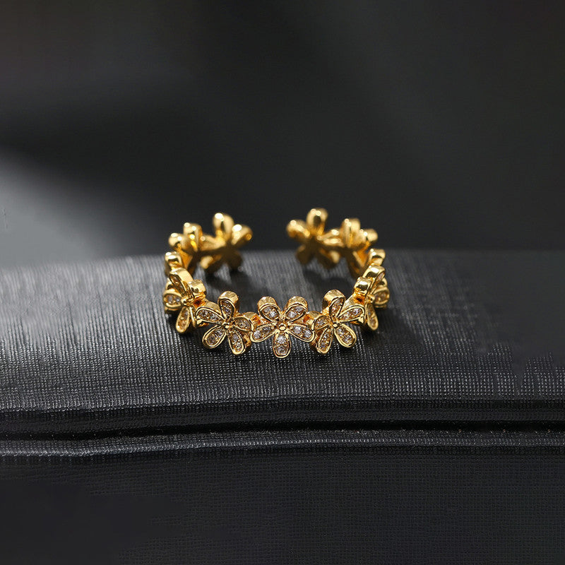 Jewels Galaxy Gold Plated Anti Tarnish Stainless Steel Floral Themed Adjustable Finger Ring
