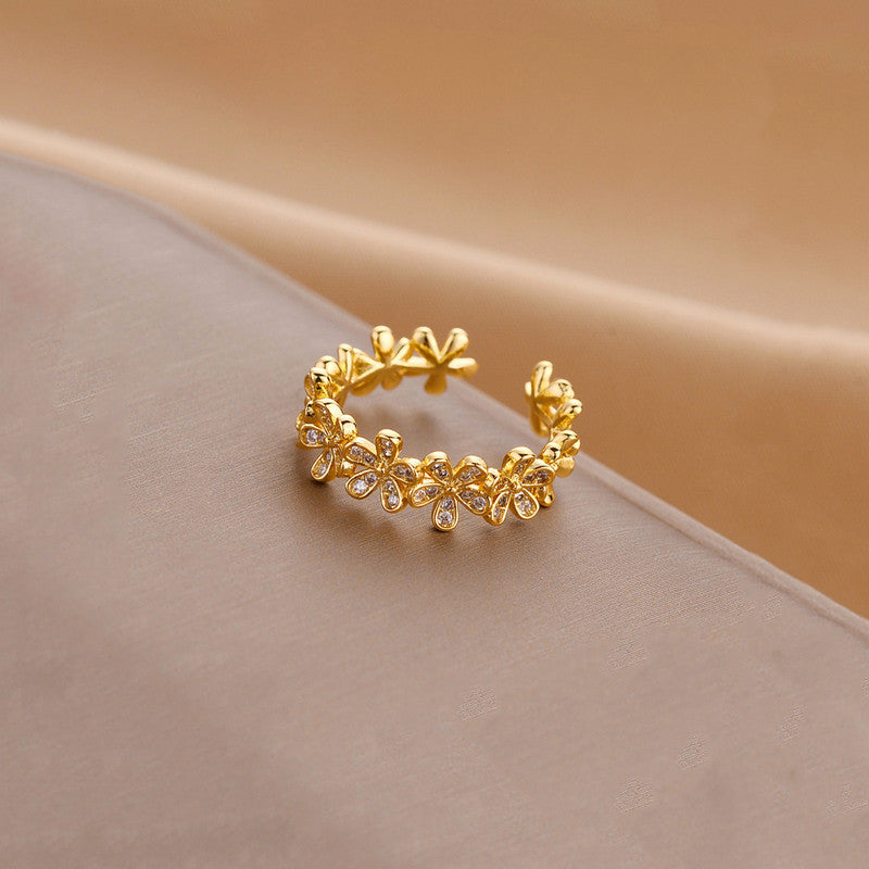 Jewels Galaxy Gold Plated Anti Tarnish Stainless Steel Floral Themed Adjustable Finger Ring