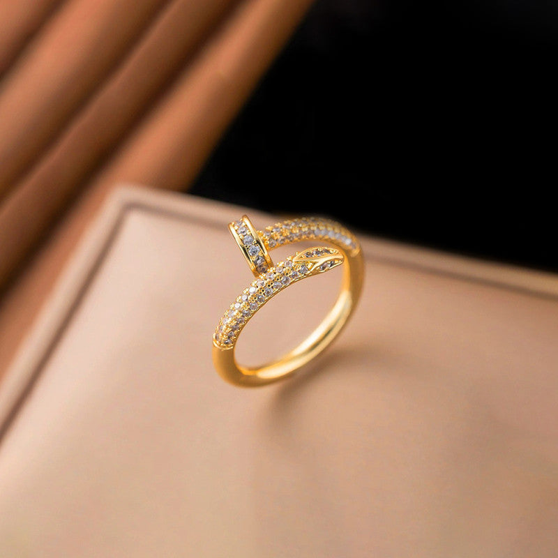 Jewels Galaxy Gold Plated Anti Tarnish Stainless Steel Nail Shaped AD Studded Adjustable Ring