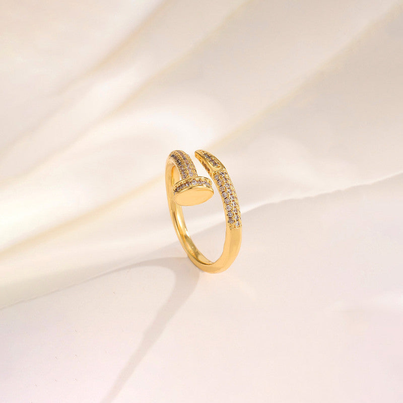 Jewels Galaxy Gold Plated Anti Tarnish Stainless Steel Nail Shaped AD Studded Adjustable Ring