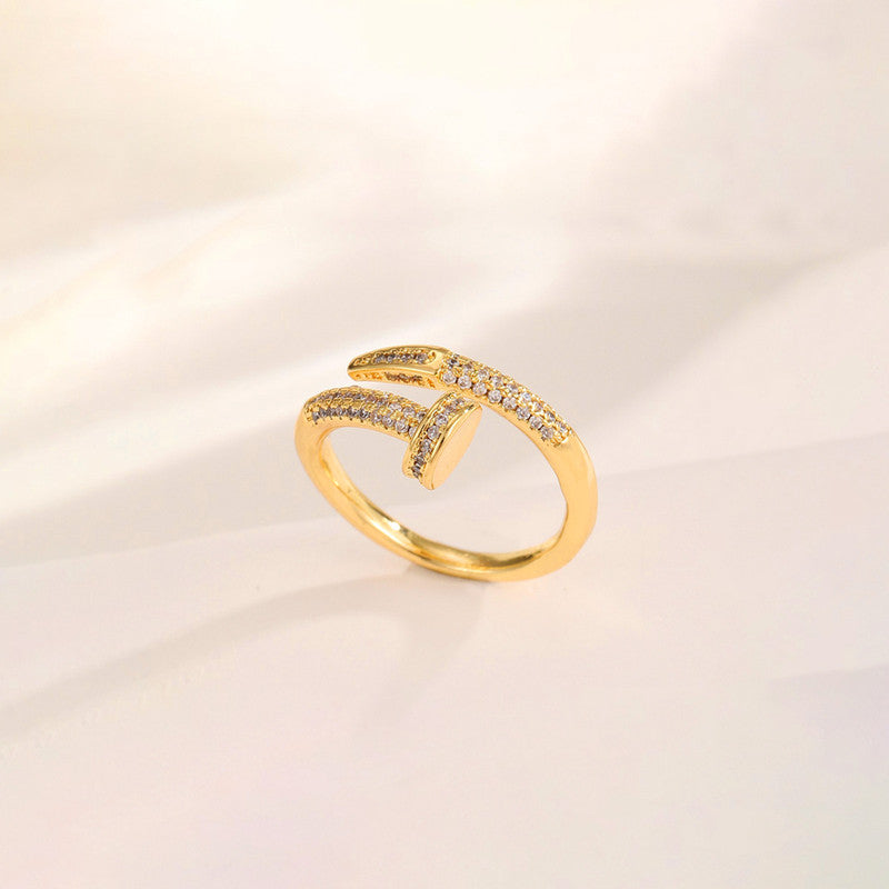 Jewels Galaxy Gold Plated Anti Tarnish Stainless Steel Nail Shaped AD Studded Adjustable Ring