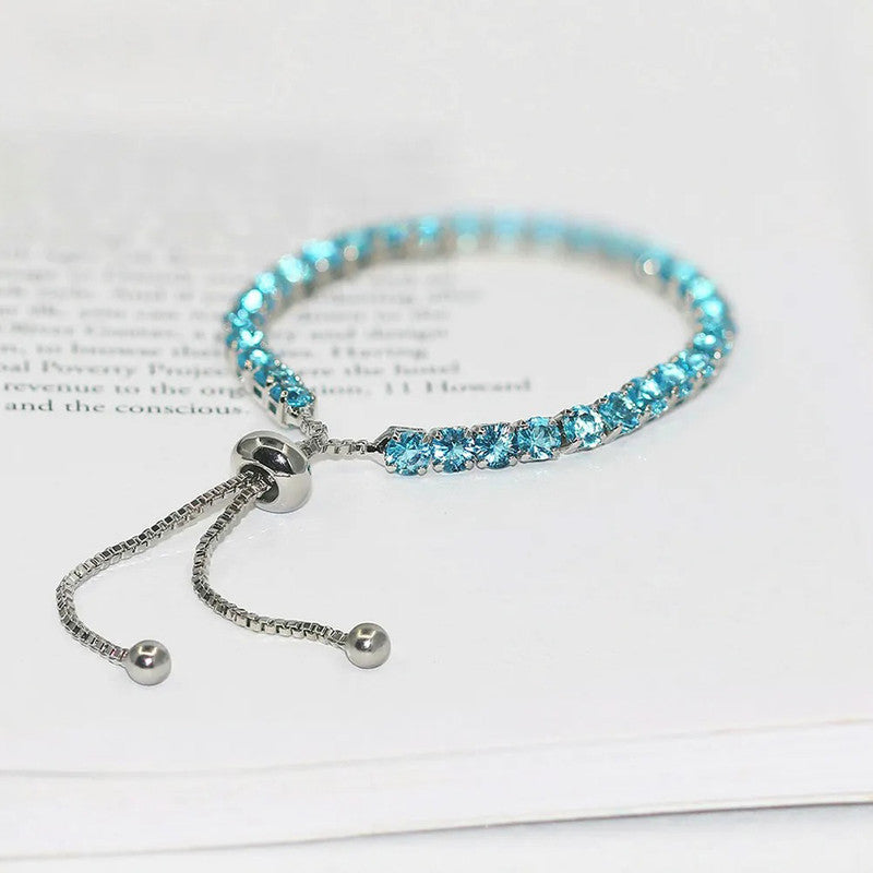 Jewels Galaxy Silver Plated Round Cut Cubic Zirconia Blue Matrix Anti Tarnish Tennis Bracelet