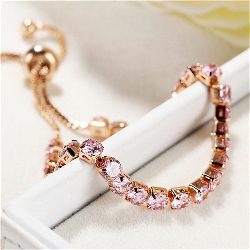 Jewels Galaxy Rose Gold Plated Round Cut Cubic Zirconia Pink Matrix Tennis Bracelet