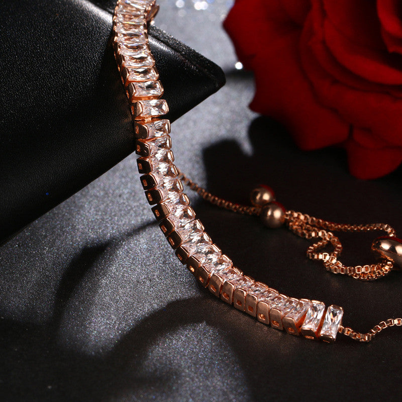 Jewels Galaxy Rose Gold Plated Rectangular Cut Cubic Zirconia White Matrix Tennis Bracelet