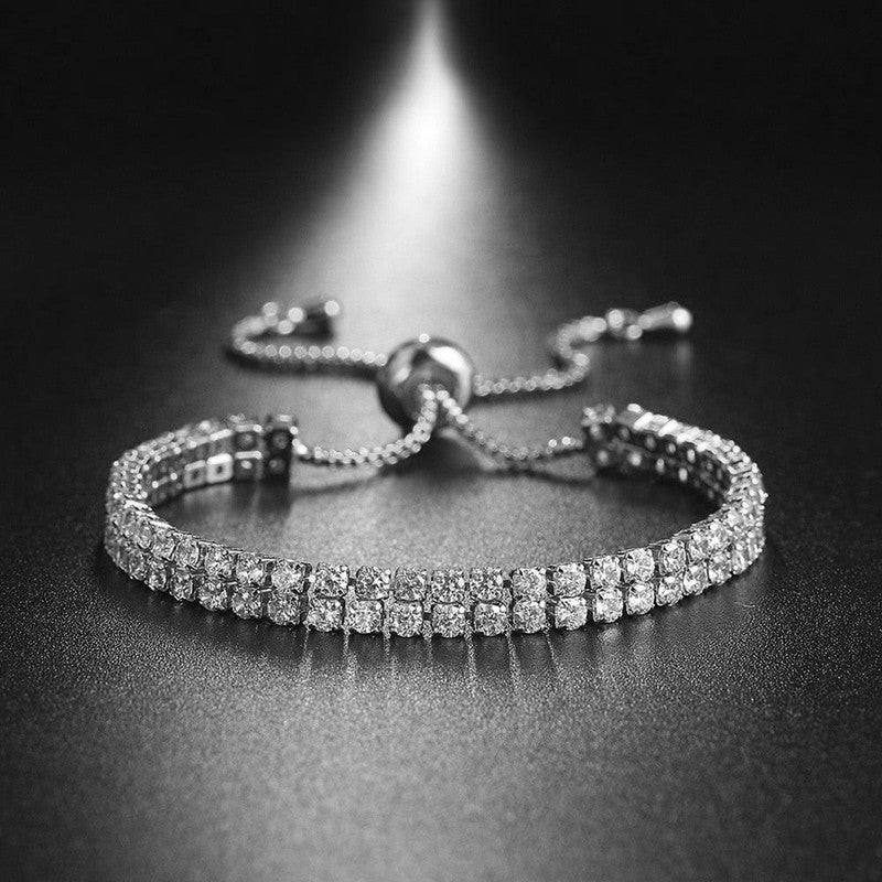 Jewels Galaxy Silver Plated Dual Strand Round Cut CZ White Matrix Anti Tarnish Tennis Bracelet