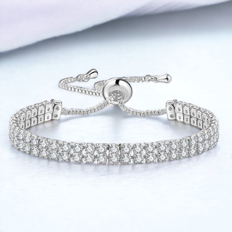 Jewels Galaxy Silver Plated Dual Strand Round Cut CZ White Matrix Anti Tarnish Tennis Bracelet