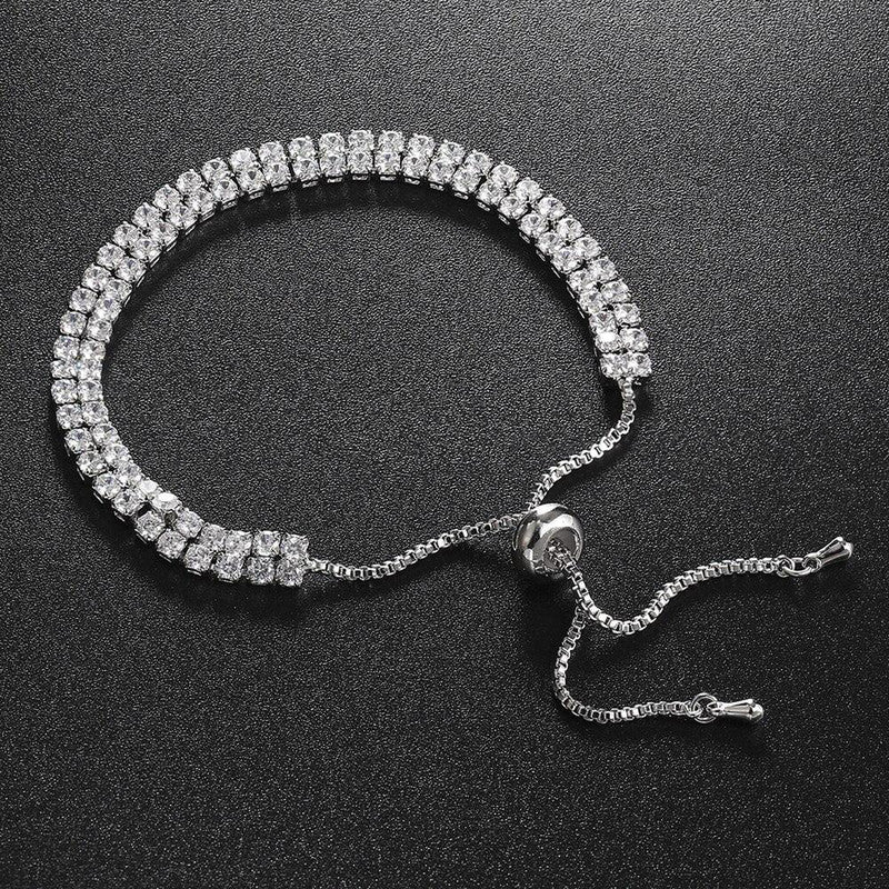 Jewels Galaxy Silver Plated Dual Strand Round Cut CZ White Matrix Anti Tarnish Tennis Bracelet