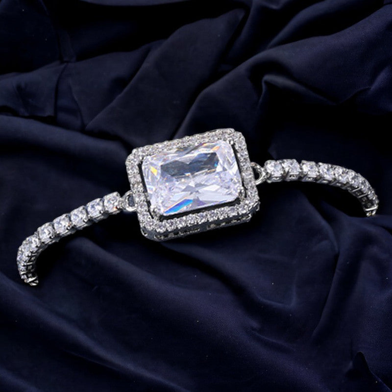 Jewels Galaxy Silver Plated Rectangular Crystal Studded Matrix Anti Tarnish Tennis Bracelet
