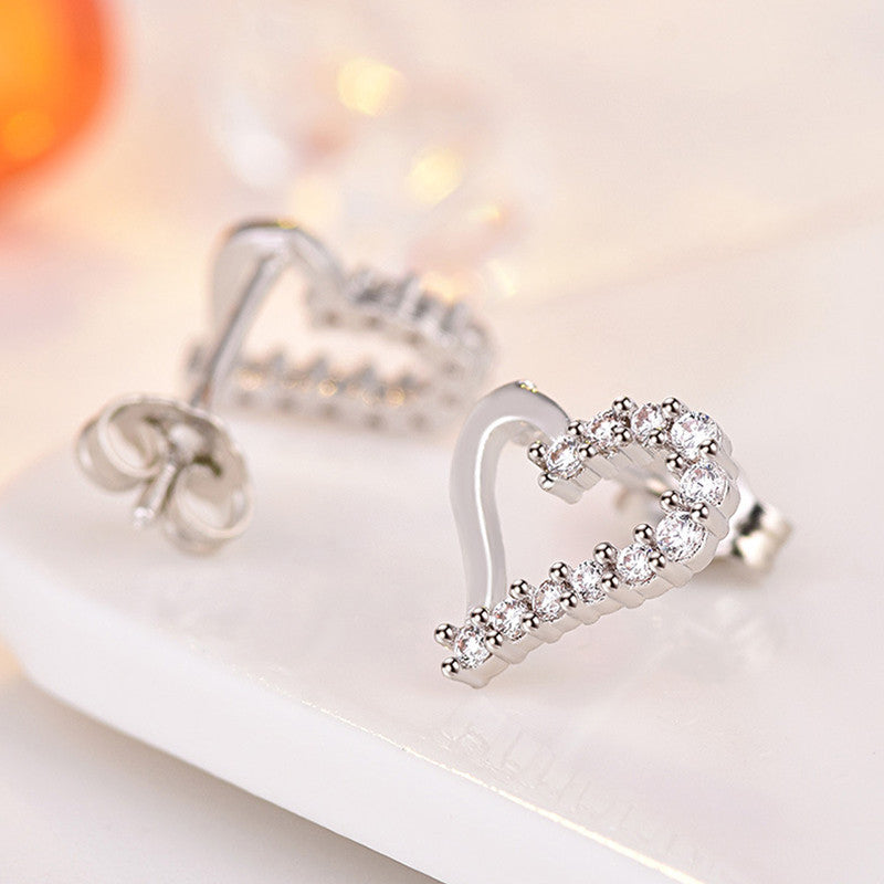 Jewels Galaxy Silver Plated American Diamond Studded Heart Shape Korean Stud Earrings