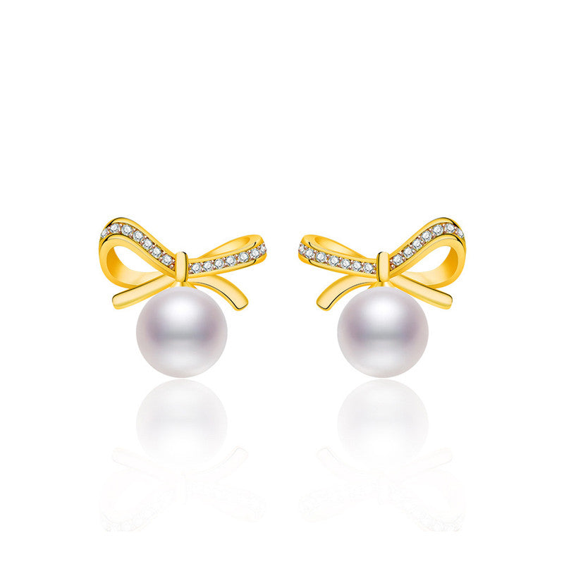 Jewels Galaxy Gold Plated American Diamond Studded Bow-Tie Shape Korean Stud Earrings