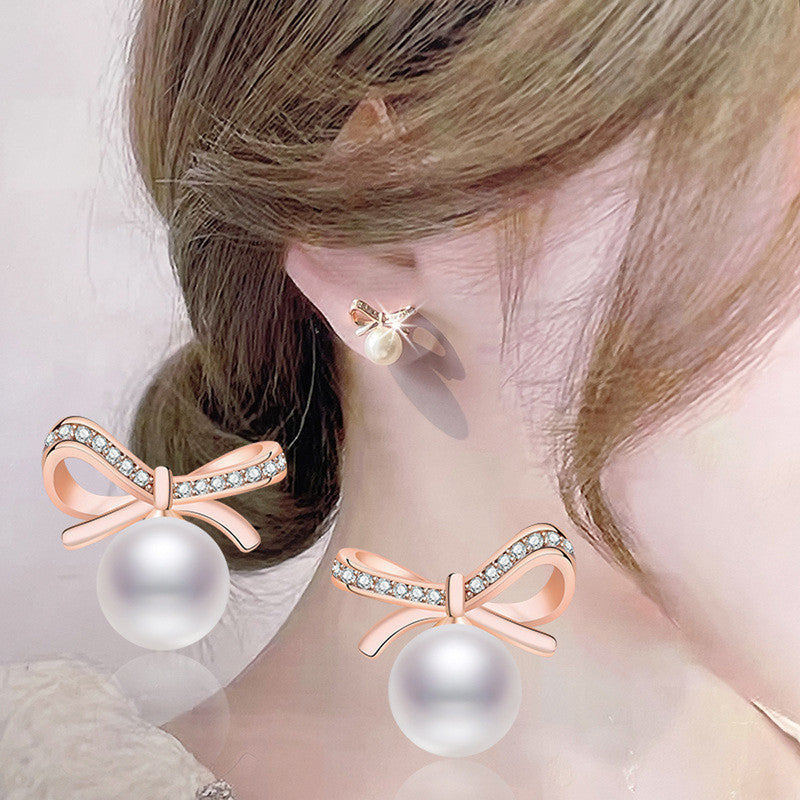 Jewels Galaxy Rose Gold Plated American Diamond Studded Bow-Tie Shape Korean Stud Earrings