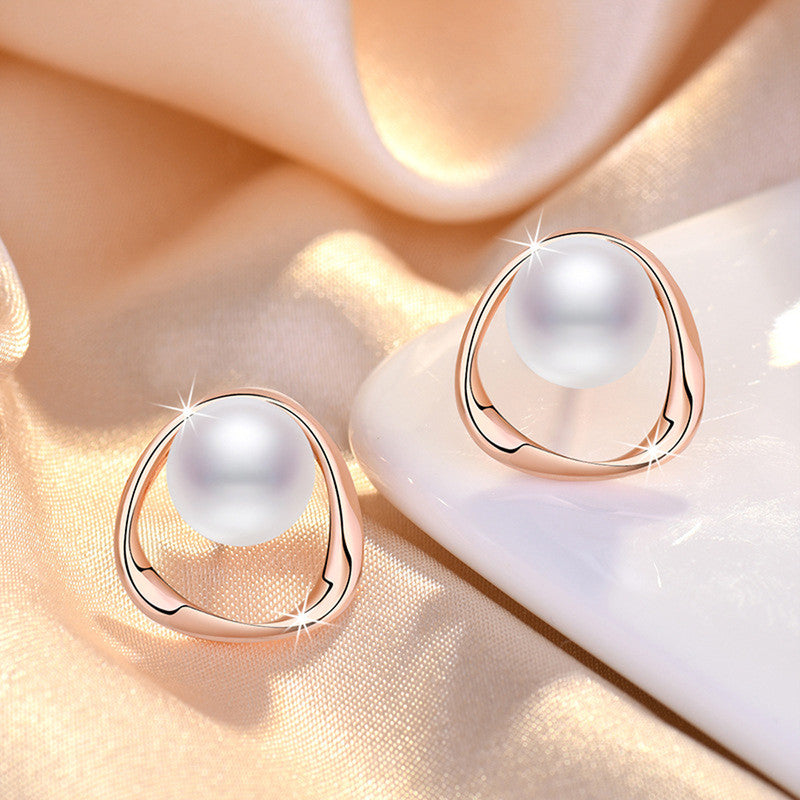 Jewels Galaxy Rose Gold Plated Triangle Shaped Pearl Studded Korean Stud Earrings