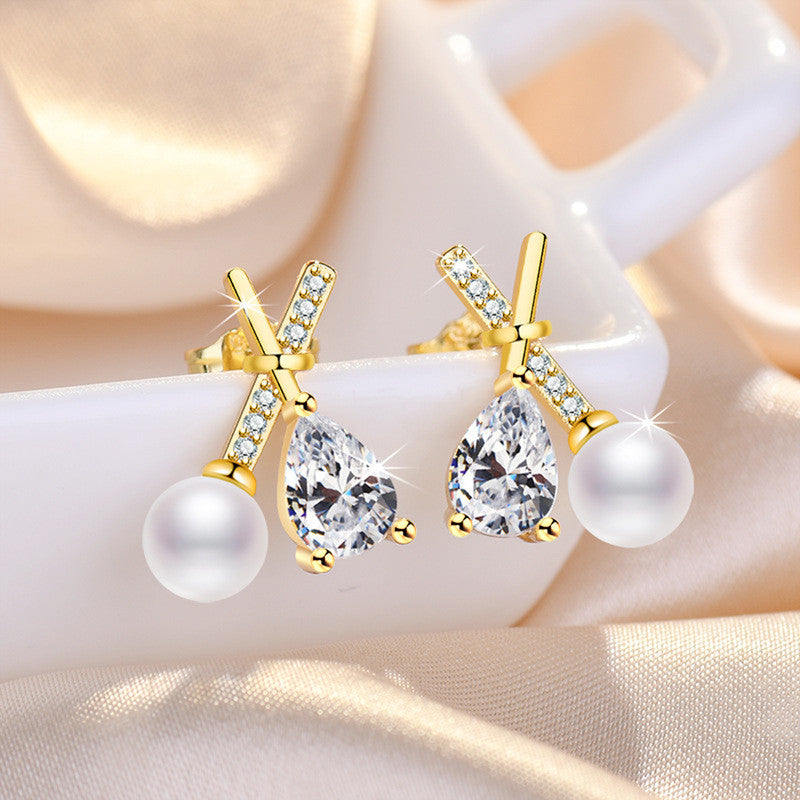 Jewels Galaxy Gold Plated American Diamond Studded Cross Shape Korean Stud Earrings