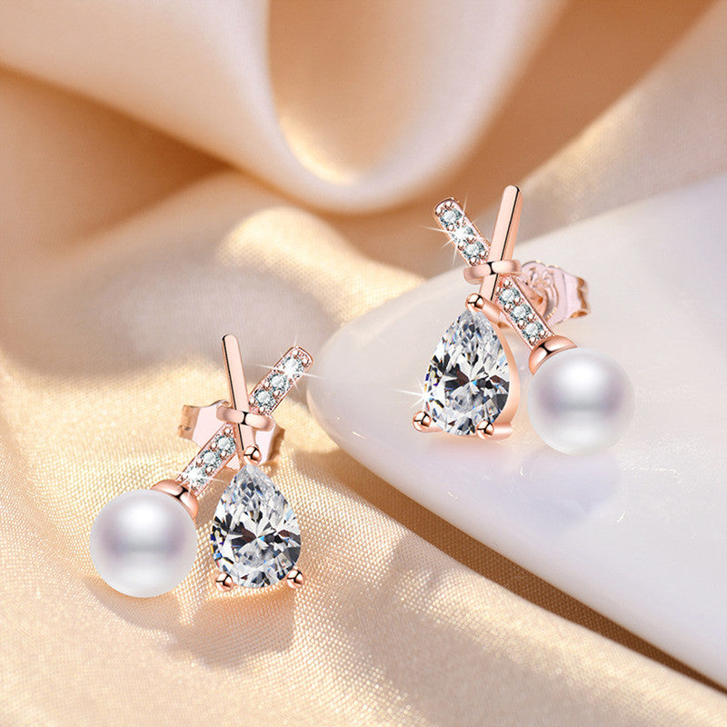 Jewels Galaxy Rose Gold Plated American Diamond Studded Cross Shape Korean Stud Earrings