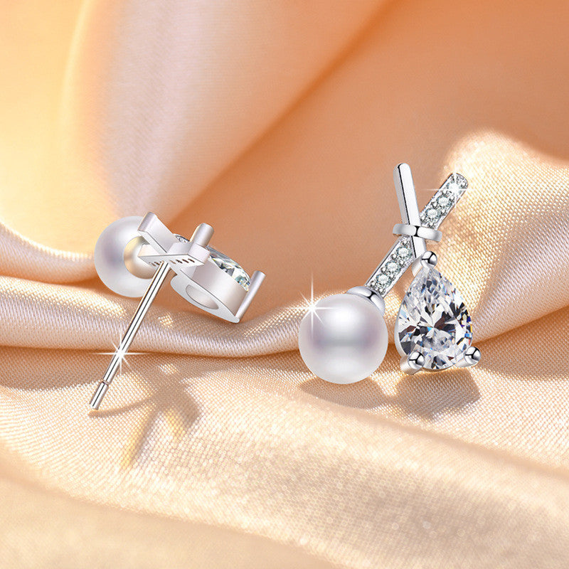 Jewels Galaxy Silver Plated American Diamond Studded Cross Shape Korean Stud Earrings
