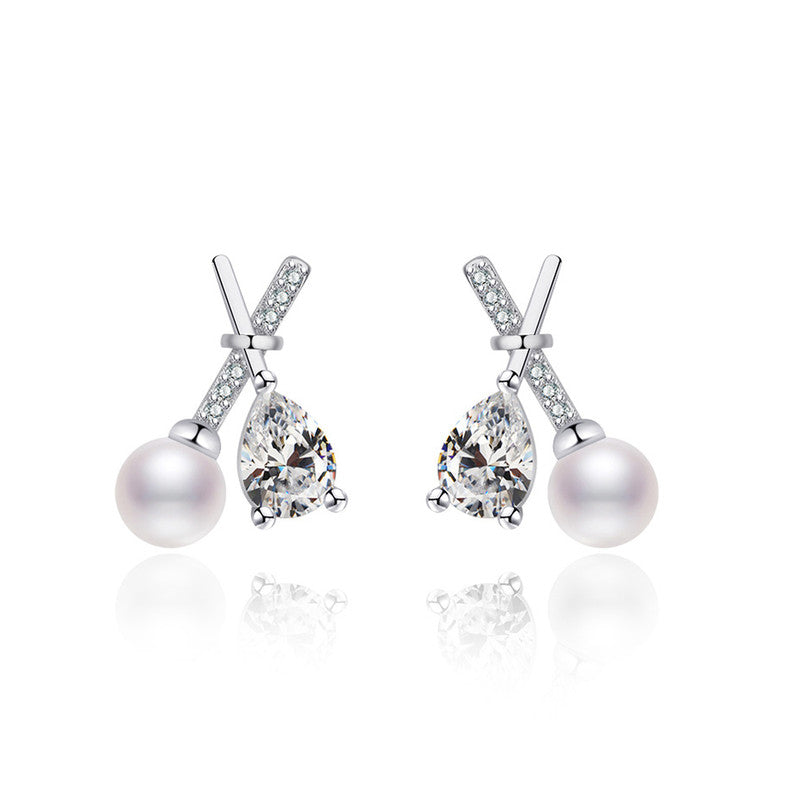 Jewels Galaxy Silver Plated American Diamond Studded Cross Shape Korean Stud Earrings