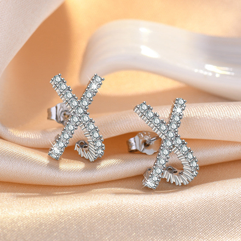 Jewels Galaxy Silver Plated American Diamond Studded Cross Shape Korean Stud Earrings