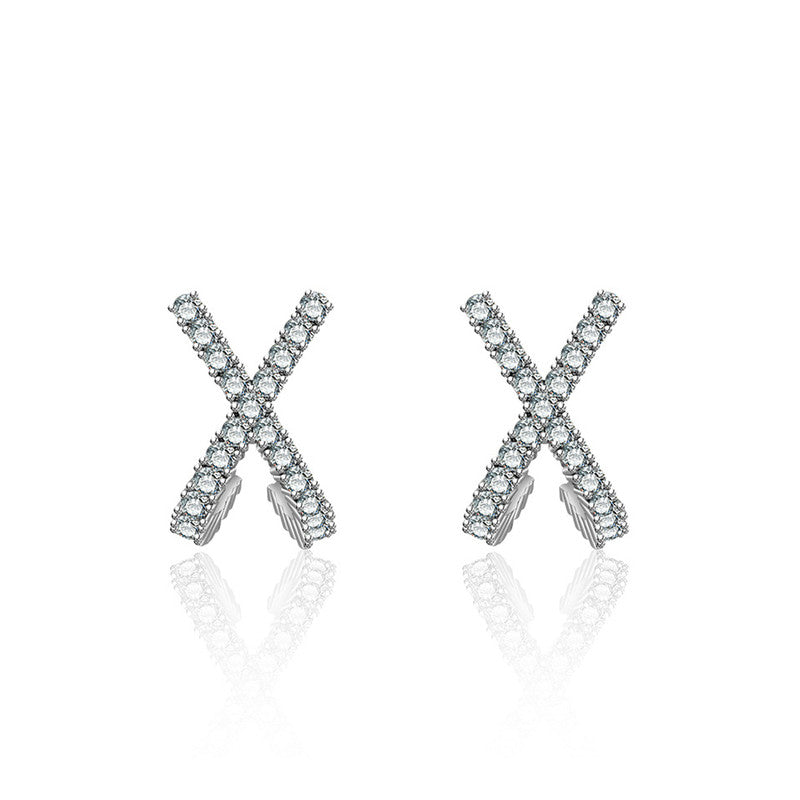 Jewels Galaxy Silver Plated American Diamond Studded Cross Shape Korean Stud Earrings