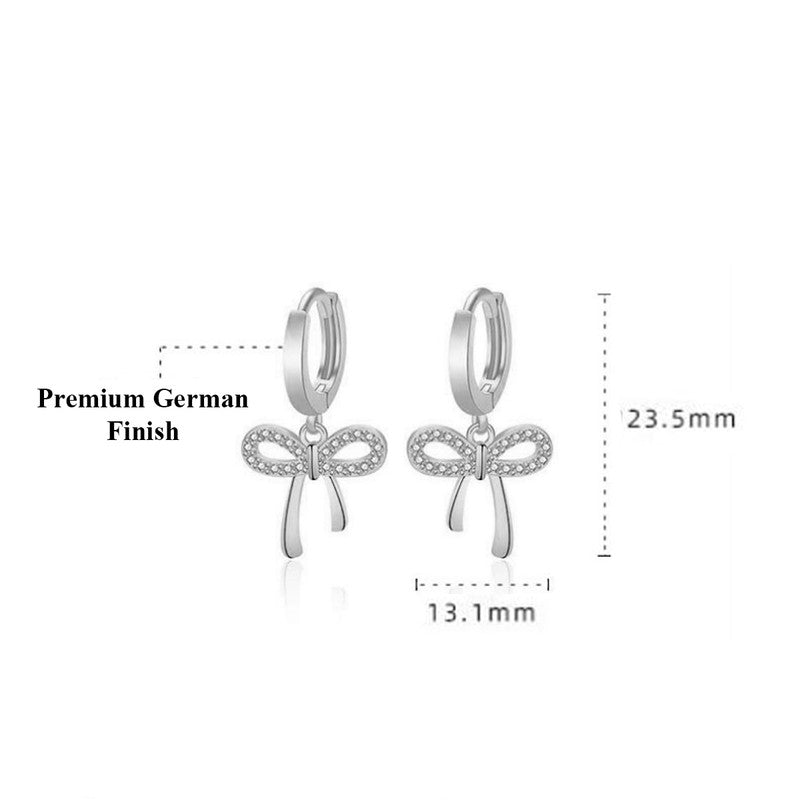 Jewels Galaxy Silver Plated American Diamond Studded Bow-Tie Shape Korean Stud Earrings