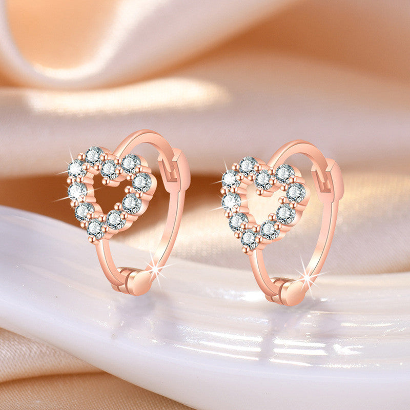 Jewels Galaxy Rose Gold Plated American Diamond Studded Heart Shape Hoop Earrings