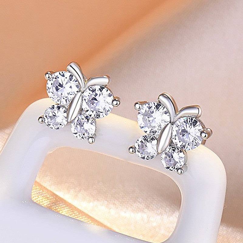 Jewels Galaxy Silver Plated American Diamond Studded Butterfly Shape Korean Hoop Earrings