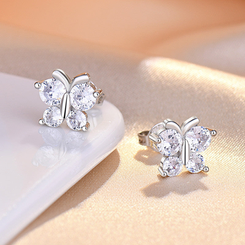 Jewels Galaxy Silver Plated American Diamond Studded Butterfly Shape Korean Hoop Earrings