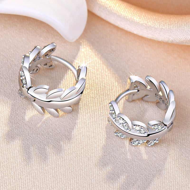 Jewels Galaxy Silver Plated American Diamond Studded Leaf inspired Hoop Earrings