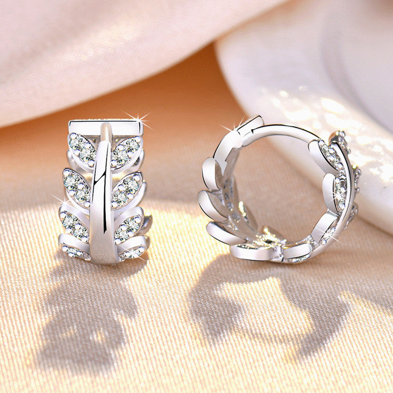 Jewels Galaxy Silver Plated American Diamond Studded Leaf inspired Hoop Earrings