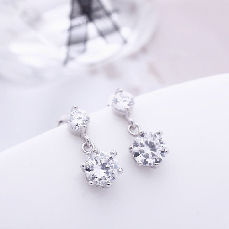Jewels Galaxy Silver Plated American Diamond Studded Hexagon Shape Korean Drop Earrings