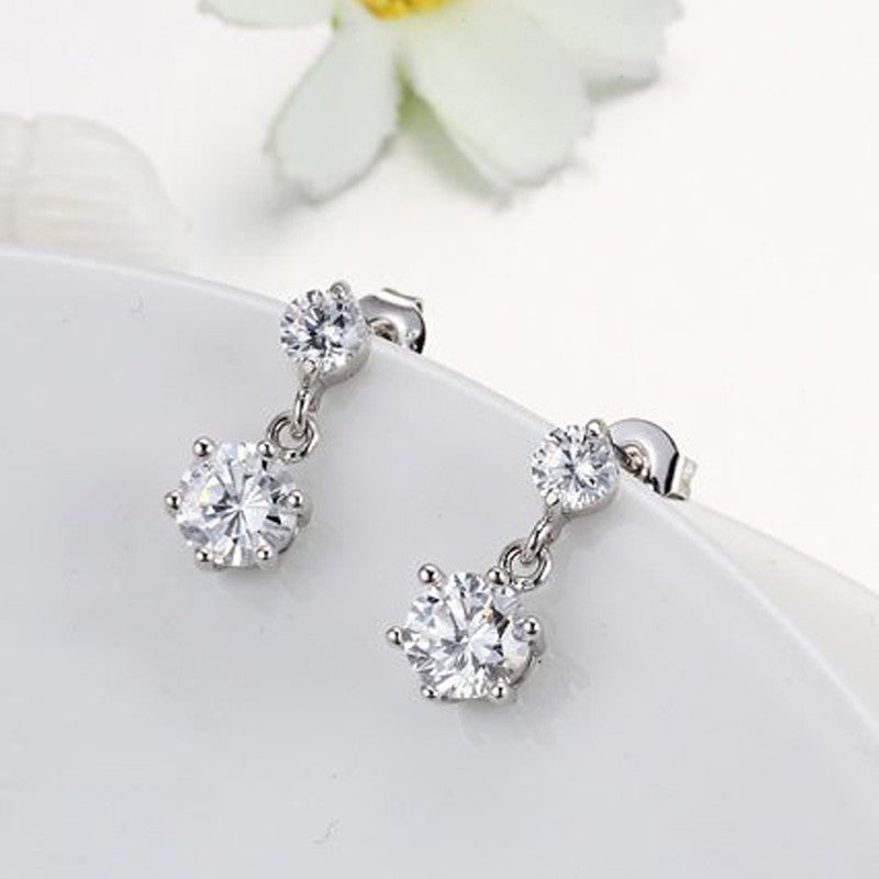 Jewels Galaxy Silver Plated American Diamond Studded Hexagon Shape Korean Drop Earrings